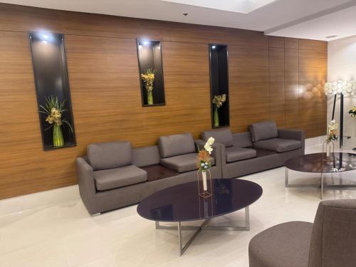 Ein Sitzbereich in der Unterkunft Juvrey Studio-Unit Breeze Residences