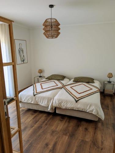 Ένα ή περισσότερα κρεβάτια σε δωμάτιο στο Oliveira House