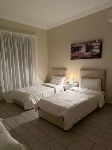 Postel nebo postele na pokoji v ubytování Meraki Resorts 15-2