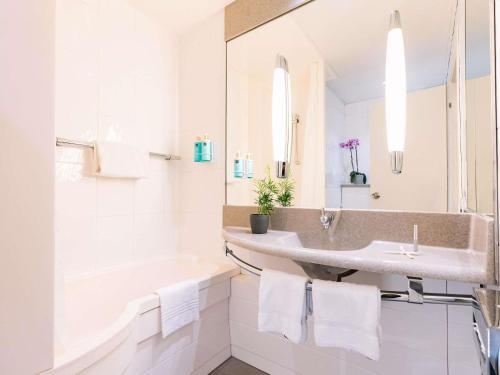 Ένα μπάνιο στο Novotel Venezia Mestre Castellana
