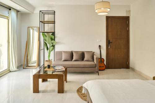 Ένα ή περισσότερα κρεβάτια σε δωμάτιο στο New Cairo cozy Apartment