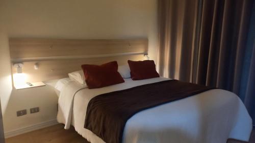 Postel nebo postele na pokoji v ubytování Apart Ingal