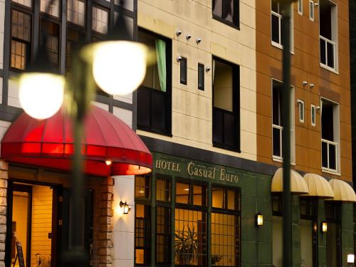 a hotel casablanca building with a red canopy in front of it at Hotel Casual Euro in Nikko
