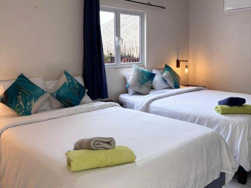 Ένα ή περισσότερα κρεβάτια σε δωμάτιο στο Boca Simon Vacation Curacao