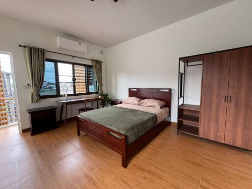 Ένα ή περισσότερα κρεβάτια σε δωμάτιο στο Nong Hoi Nest, New Townhome in Local Neighborhood