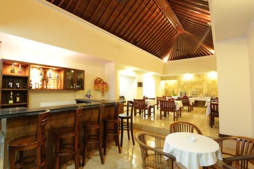 A restaurant or other place to eat at Hotel Segara Agung
