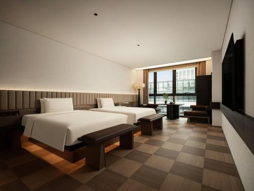 Postel nebo postele na pokoji v ubytování SAVHE Hotel Guangzhou Financial City - Free night snacks and afternoon tea-Free Self-service laundry