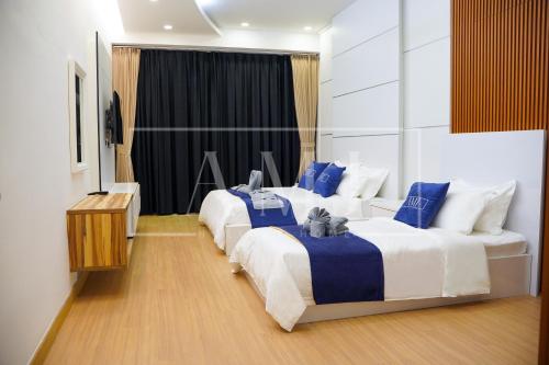 Postel nebo postele na pokoji v ubytování Cyberjaya - Puchong Luxury Private Swimming Pool Villa with BBQ - Corner lot up to 20 Guests