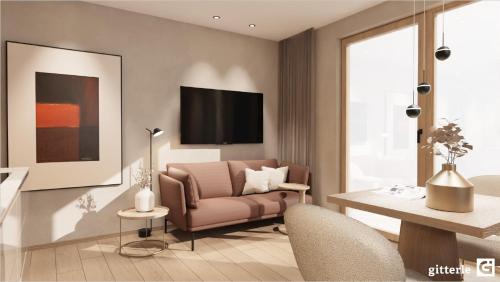a living room with a couch and a table at Vista Apartments in Seefeld in Tirol