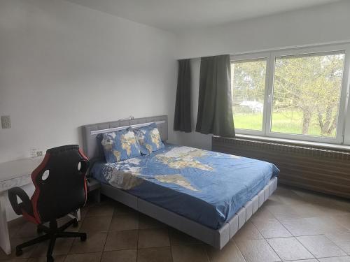 Ένα ή περισσότερα κρεβάτια σε δωμάτιο στο cozy studio Brussels airport