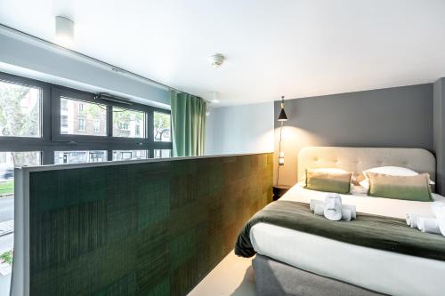 Llit o llits en una habitació de Sweett - Studio Brune