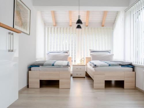 Katil atau katil-katil dalam bilik di Ferienwohnung Lenne Traum