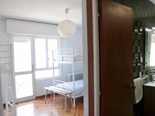 Postel nebo postele na pokoji v ubytování Amplia y cómoda casa en la playa de Berria