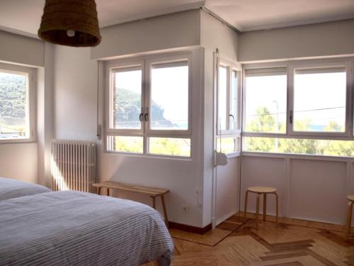 Postel nebo postele na pokoji v ubytování Amplia y cómoda casa en la playa de Berria