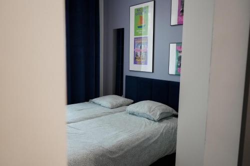 Postel nebo postele na pokoji v ubytování ADLER CHILL Apartments