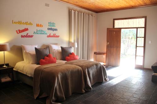 En eller flere senger på et rom på Augrabies Valle Guesthouse