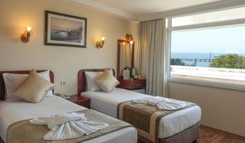 Voodi või voodid majutusasutuse Hotel Akyildiz toas