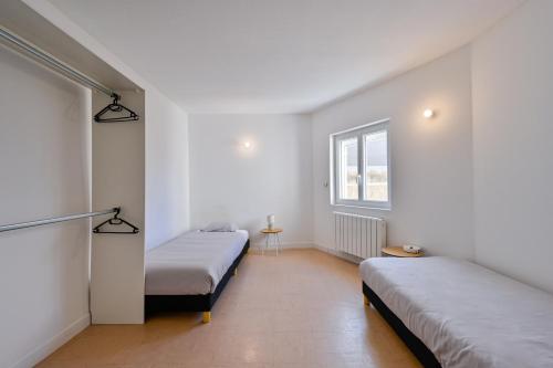 Postel nebo postele na pokoji v ubytování L'Escale Brièronne - Confortable au cœur de la Brière