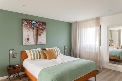 Ένα ή περισσότερα κρεβάτια σε δωμάτιο στο Villa Ty Laouen - Proche Plage