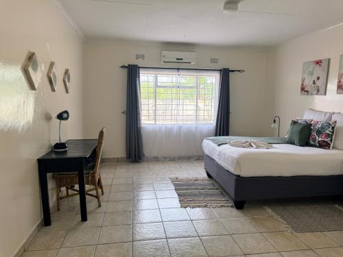 Postel nebo postele na pokoji v ubytování Laha Apartment 3