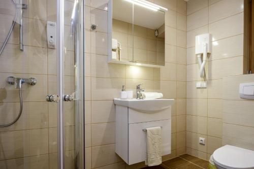 Vonios kambarys apgyvendinimo įstaigoje Vila Elegancija