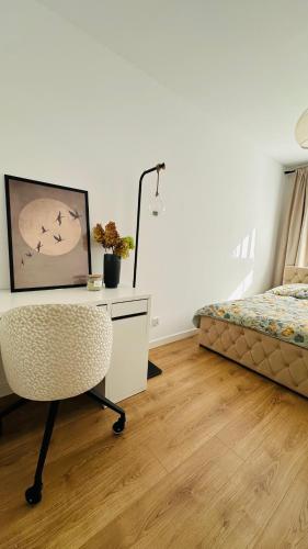 En eller flere senge i et værelse på Nature & Design - Apartament pod lasem