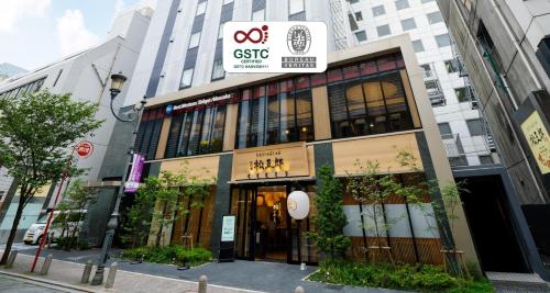 a building with a sign on the front of it at Best Western Hotel Fino Tokyo Akasaka in Tokyo