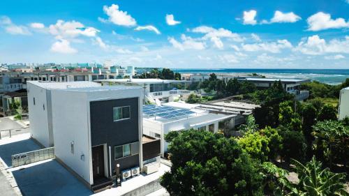 an aerial view of a building in a city at Ishigaki Island villa KURO in Ishigaki Island