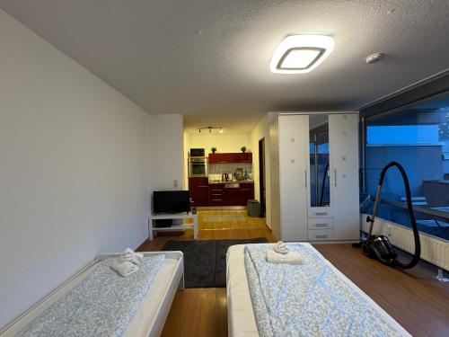 Postel nebo postele na pokoji v ubytování Mini Apartment Saarlouis