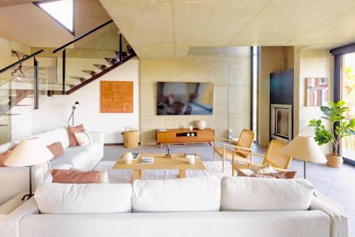 Posezení v ubytování Villa Angelu, Encanto Arquitectónico con Piscina Privada