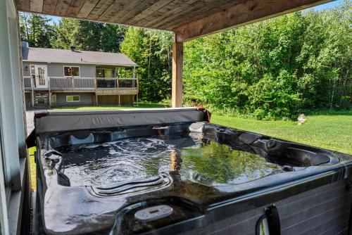 Zahrada ubytování Lake - Spa - Pool Table - Chalet Ookpik