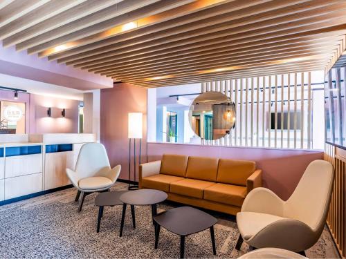 Χώρος καθιστικού στο B&B Hotel Erlangen-Süd