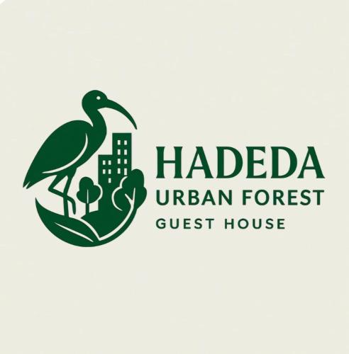 a logo for an urban forest guest house at Hadeda Cottage in Johannesburg