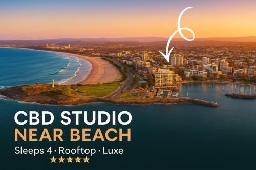 a poster of a beach with the words cbd studio near beach at CBD Studio - Sleeps 4 - Rooftop Courtyard - Views in Wollongong