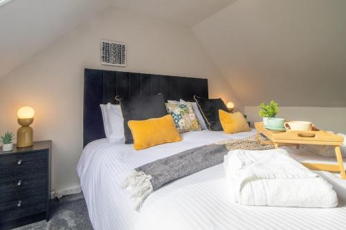 Ένα ή περισσότερα κρεβάτια σε δωμάτιο στο Corsehill Cottage - 3 Bedroom, 2 bathroom House