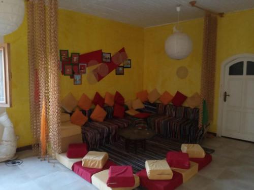 a living room with a couch and a table at جزيره سهيل in Aswan