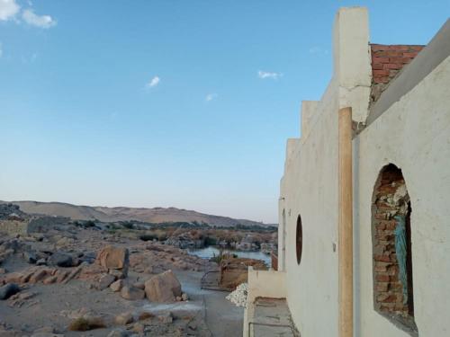 an old building with a view of the desert at جزيره سهيل in Aswan