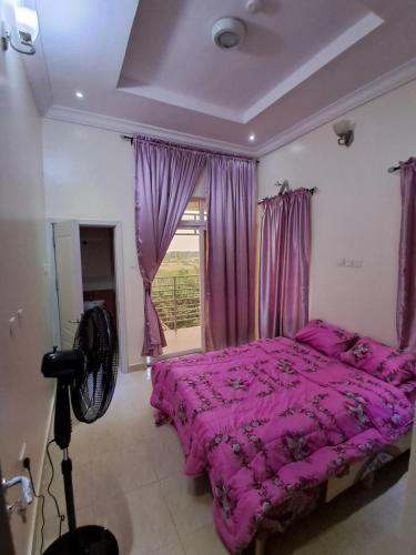 Postel nebo postele na pokoji v ubytování Exquisite Home 2