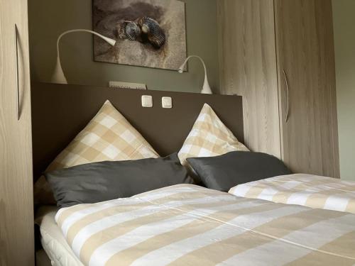 Ένα ή περισσότερα κρεβάτια σε δωμάτιο στο HyggeZeit 27