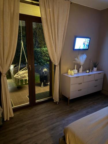 Postel nebo postele na pokoji v ubytování I Fiori del Lago Apartment