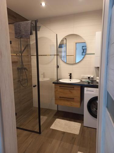 Koupelna v ubytování Apartament ósemka