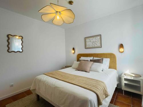 Ένα ή περισσότερα κρεβάτια σε δωμάτιο στο Pijamas House 2