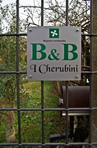 a sign on a fence that reads bc and bctctitivity at B&B I Cherubini in Cislago