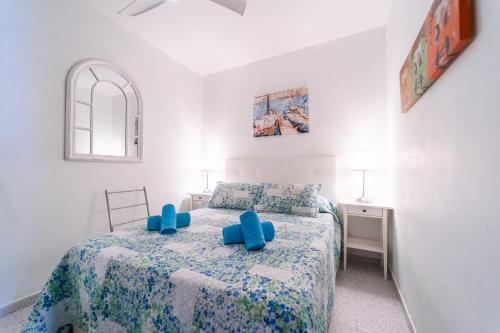 Ένα ή περισσότερα κρεβάτια σε δωμάτιο στο Casita Azul