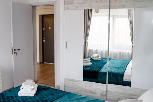 En eller flere senger på et rom på DREAMS ESCAPE