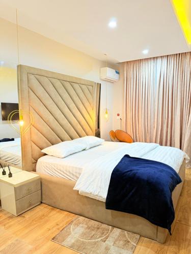 Postel nebo postele na pokoji v ubytování Lush Cove Apartments
