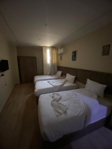 Katil atau katil-katil dalam bilik di Pyramids Hotel & Free pickup shuttle