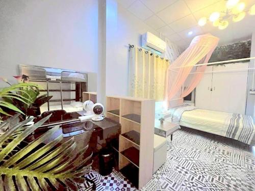 Postel nebo postele na pokoji v ubytování Merit Courtyard Suvarnabhumi House