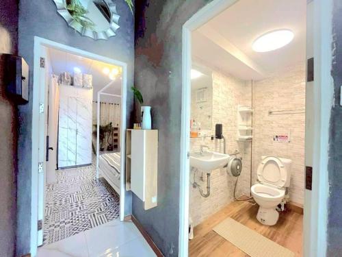 Koupelna v ubytování Merit Courtyard Suvarnabhumi House