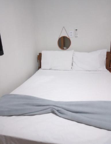 Una cama o camas en una habitación de Casarosapiri